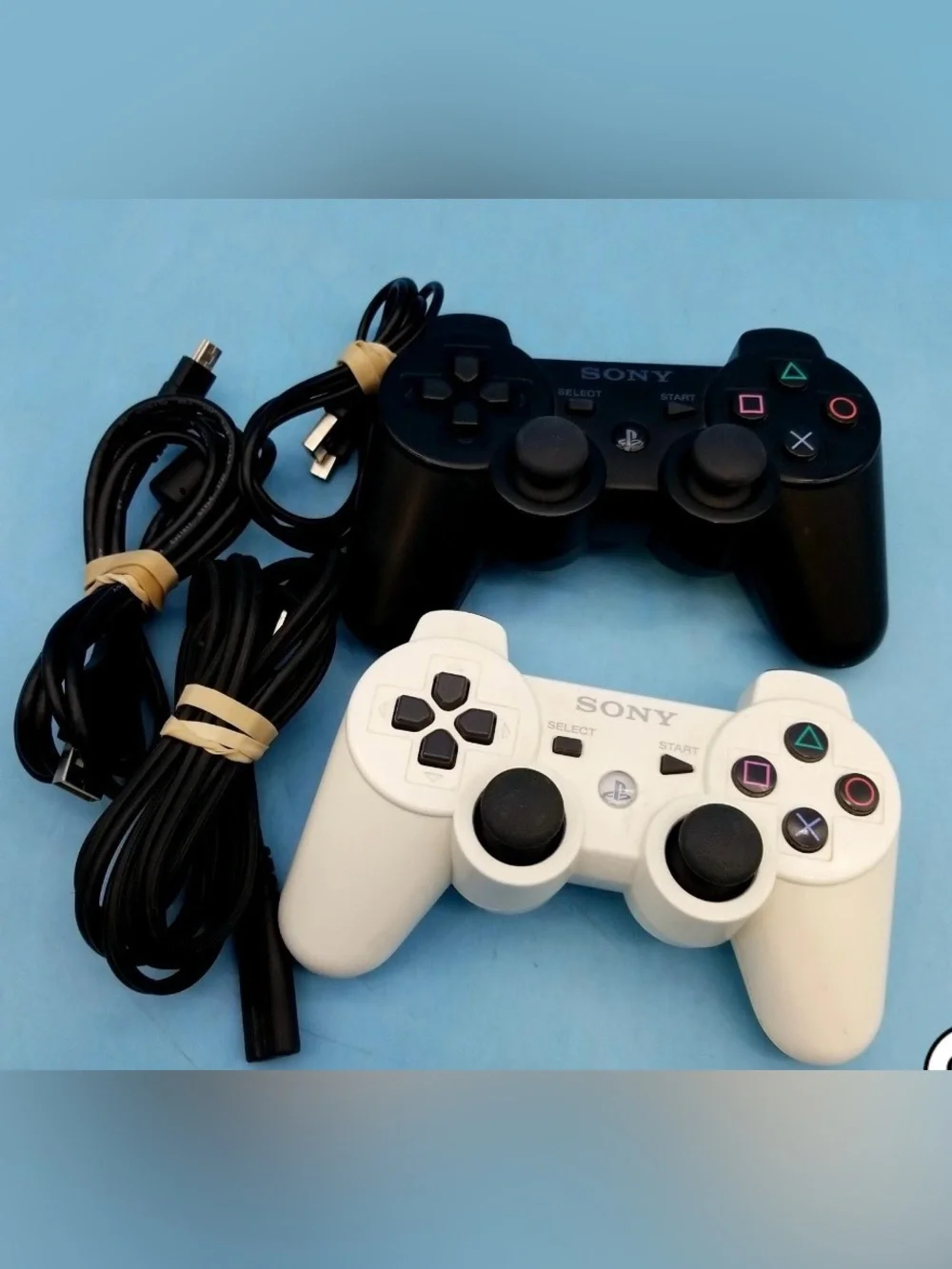 Sony PS3 Super Slim Console Bundle with Dual Controllers & 4 Games